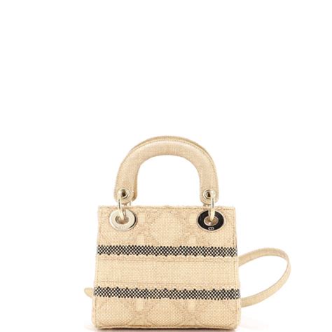 christian dior raffia cannage bag.